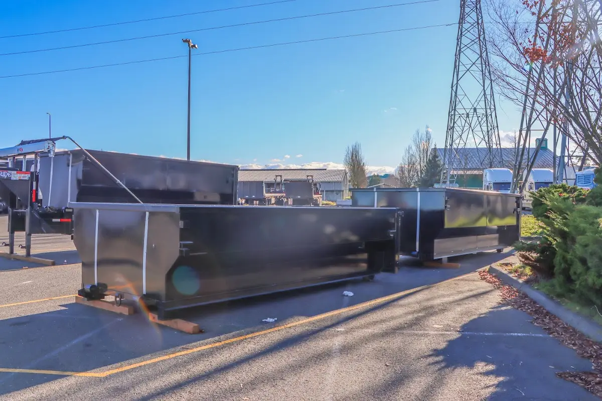 Roll-off dumpster ready for waste disposal at job site for 2 Yard Dumpster Rental in Fort Carson